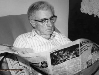 Dell Deaton's paternal grandfather reading Aug 1 1984 issue of The Saline Reporter