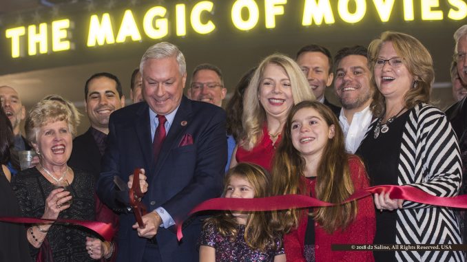 Paul Glantz, Chairman of Emagine Entertainment, cuts ribbon opening new theatre in Hartland Michigan